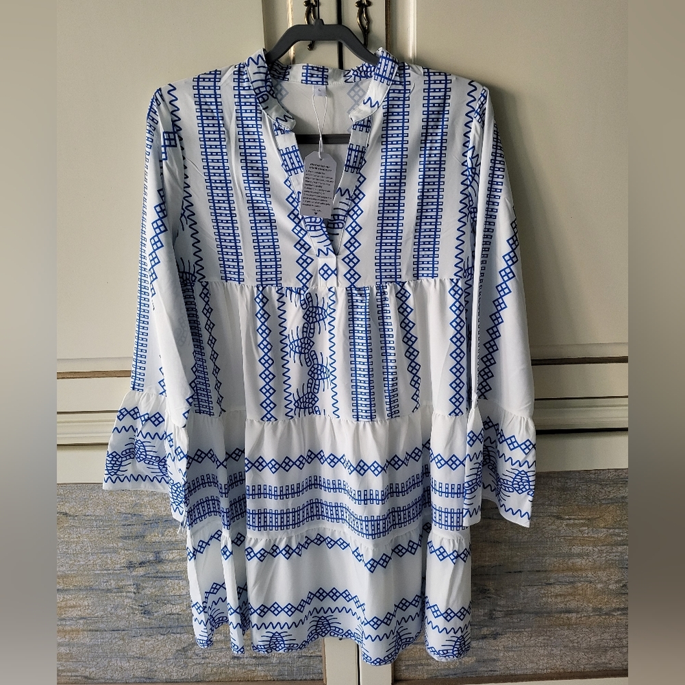 Dress. Size Large. White with royal blue design.